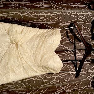 Augusta Jones ivory lace bridal gown. Size 16.